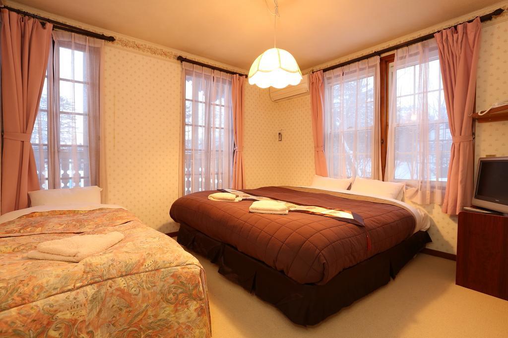 Alpine Wind Bed and Breakfast Hakuba Rum bild