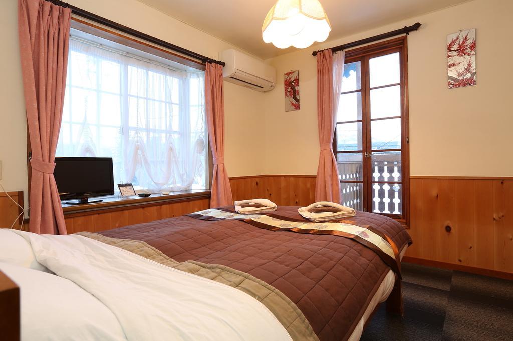 Alpine Wind Bed and Breakfast Hakuba Rum bild